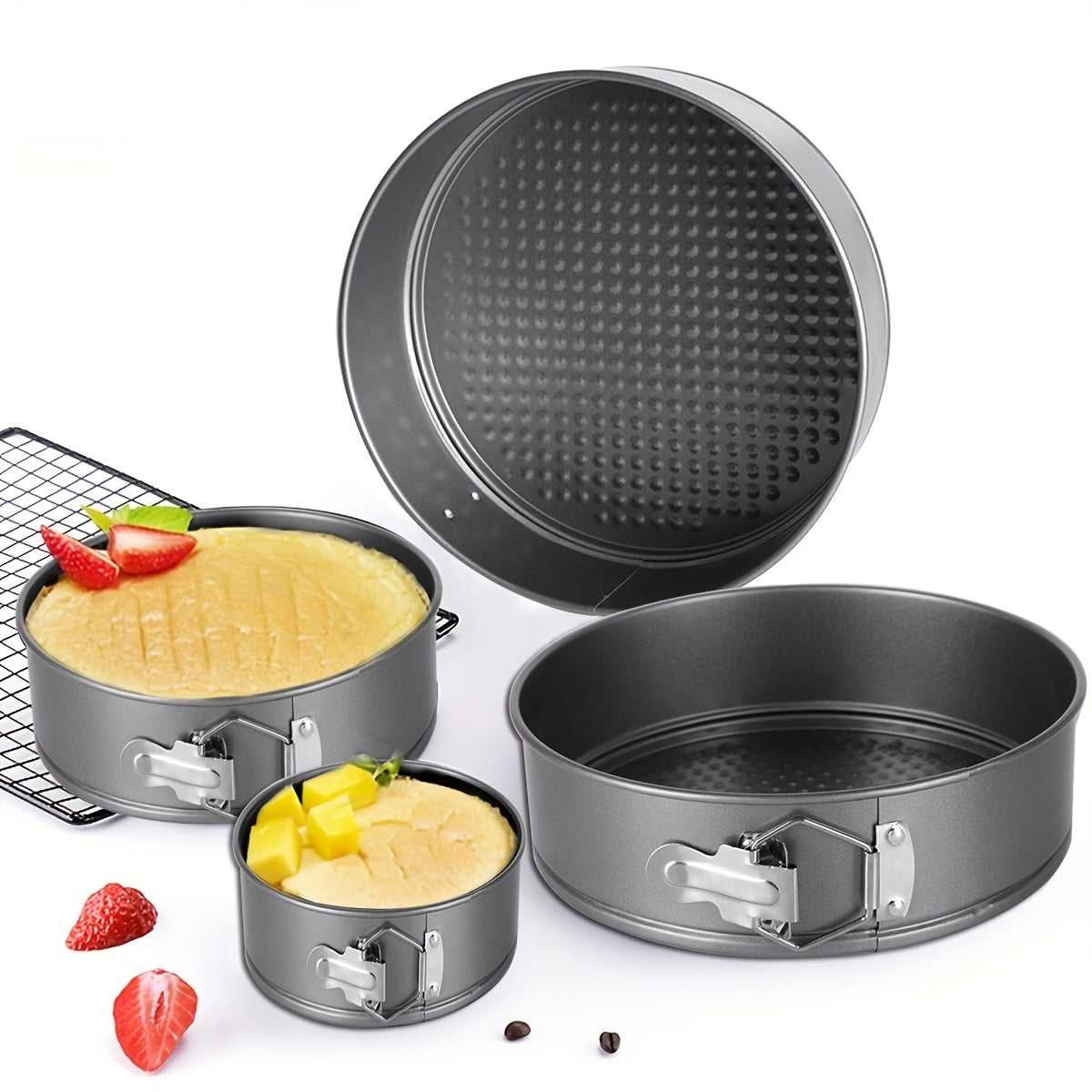 Set of 4 Springform cake pans with removable bottoms, perfect for baking cakes. These non-stick pans are essential oven accessories and useful kitchen tools for baking enthusiasts. Add these versatile and convenient kitchen gadgets to your collection of