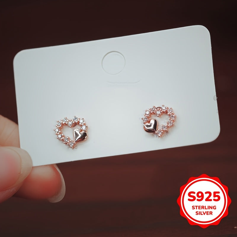 These graceful heart-shaped earrings are crafted from S925 silver with synthetic zirconia stones. Their simple and minimalist design is perfect for girls who prefer a cool and elegant style. These versatile earrings make a great gift for birthdays or