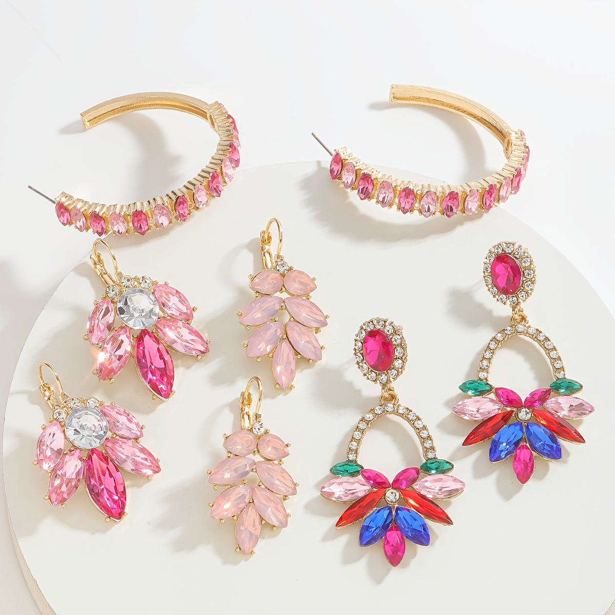 Shimmering pink floral and leaf earrings adorned with rhinestones - chic fashion accessory, made of gold-tone zinc alloy with stainless steel posts, perfect Valentine's Day gift for your girlfriend, suitable for all occasions and seasons.