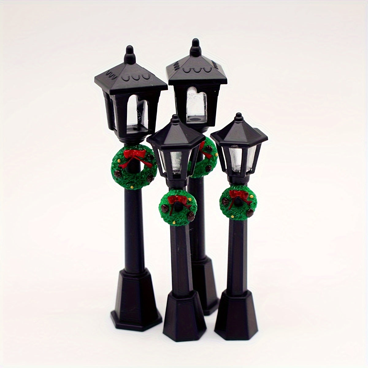 3 Miniature Christmas Lamp Posts with Wreaths, Collectible Seasonal Figurines, Plastic Material, No Electricity Needed