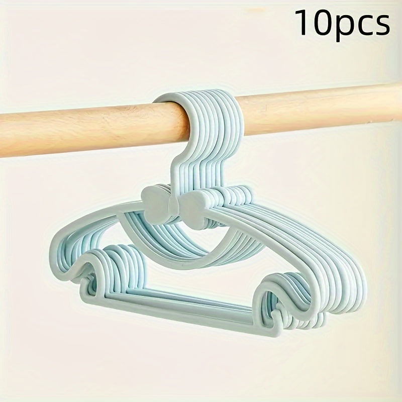 10-piece set of sturdy plastic hangers for kids' clothing - features anti-slip design and space-saving storage solution for children's wardrobes and dorm rooms.