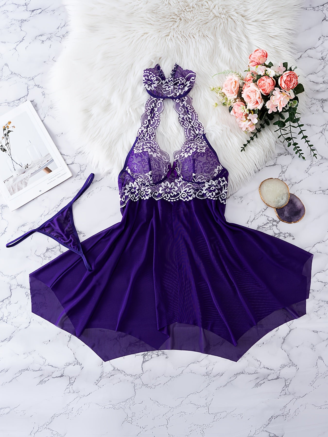 Elegant lace halter top nightgown and lingerie set for women made of polyester and elastane blend. Features solid color with bow detail, knit fabric with no chest pad or belt.