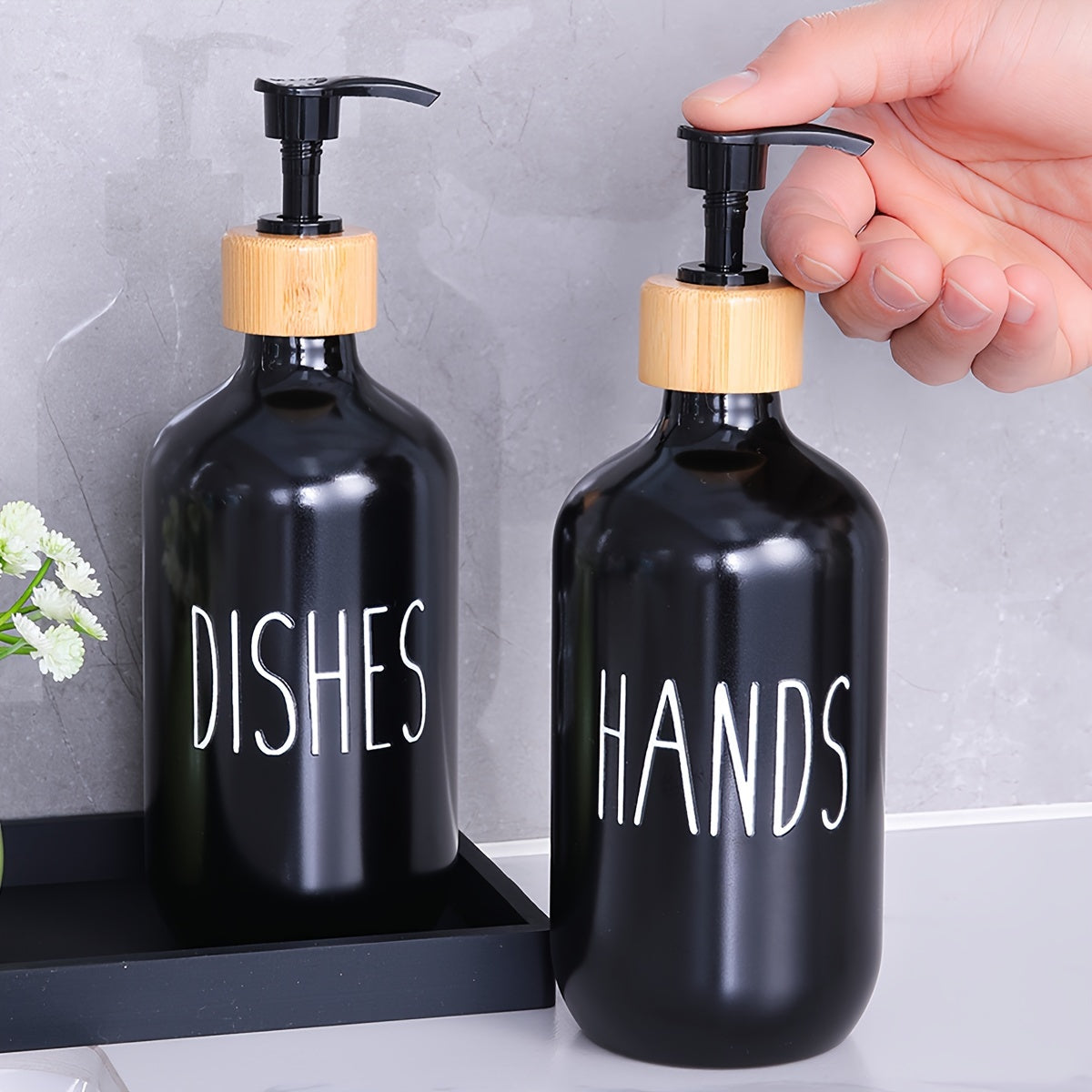 Set of 2 soap dispensers for hand and dish soap, with a countertop lotion bottle for bathroom use.