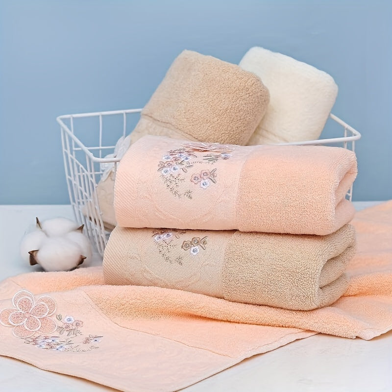 2 Cotton embroidered hand towels with quick-drying, absorbent material for home bathrooms.