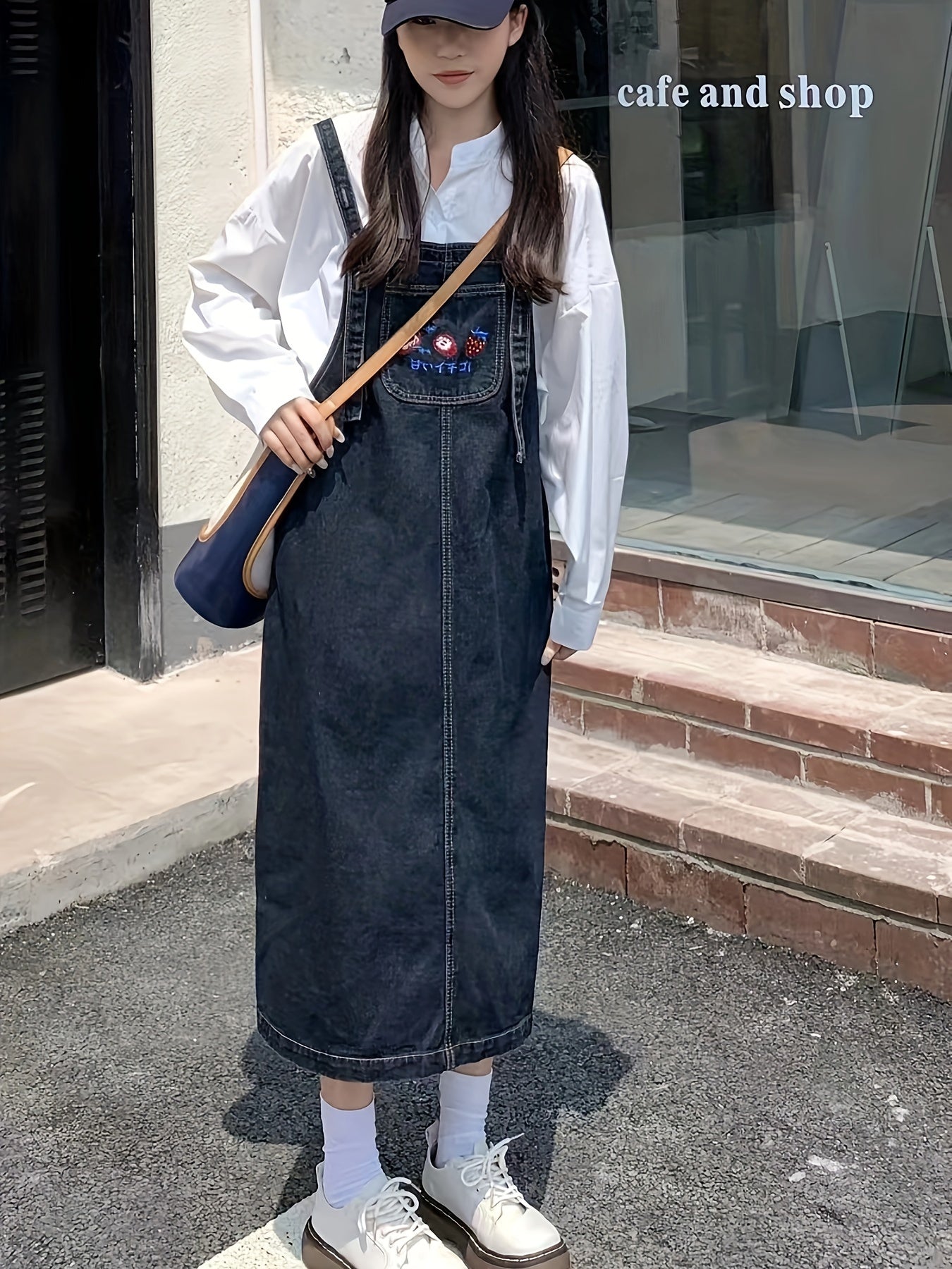 Women's dark washed denim overalls dress with cute strawberry embroidery pocket, loose fit, and casual style.