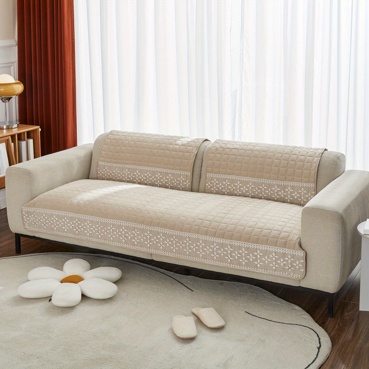 Quilted lace sofa covers for sectional sofas, protecting furniture and enhancing home decor.