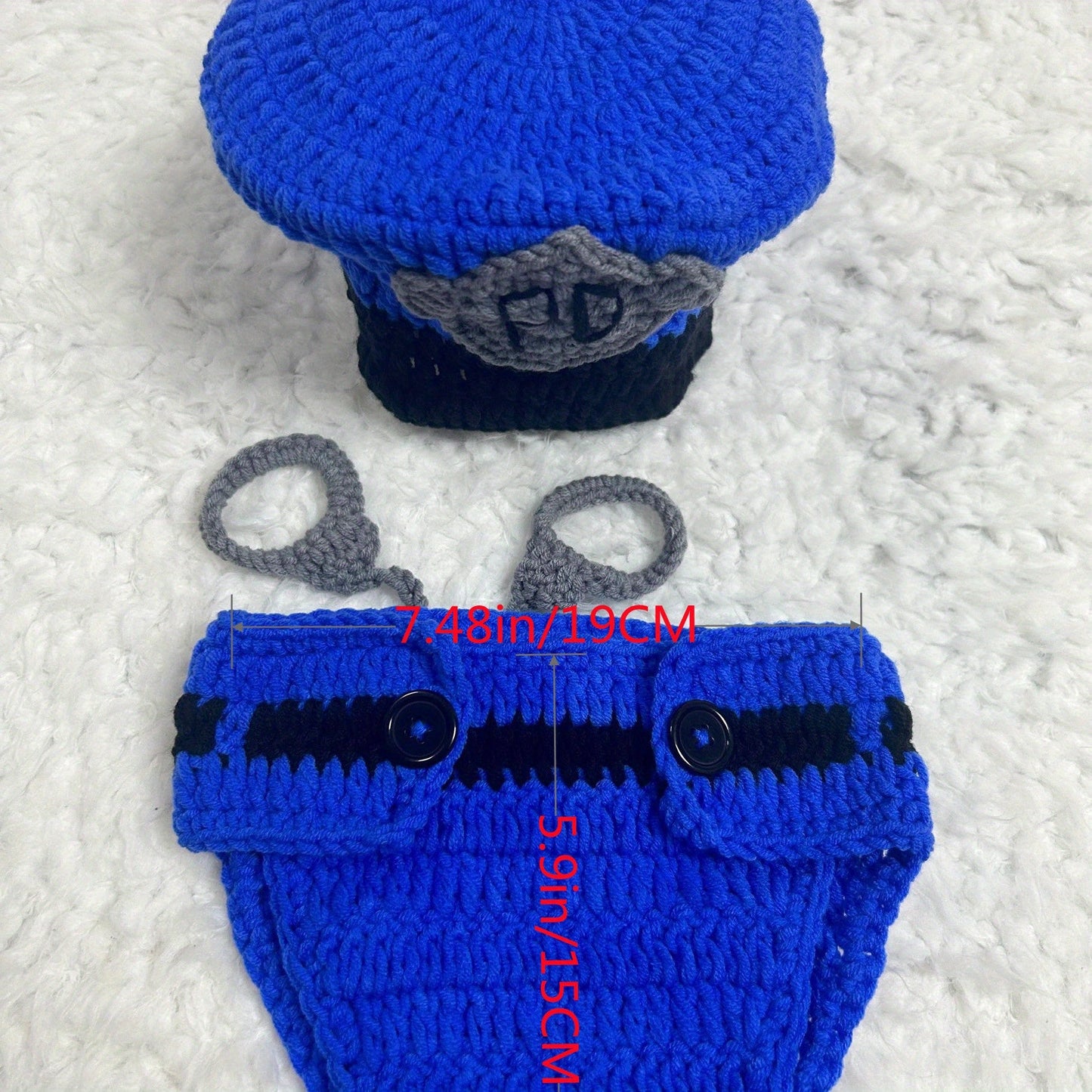 Perfect for Newborn Photo Shoots, this charming set features an adorable blue policeman hat and shorts.