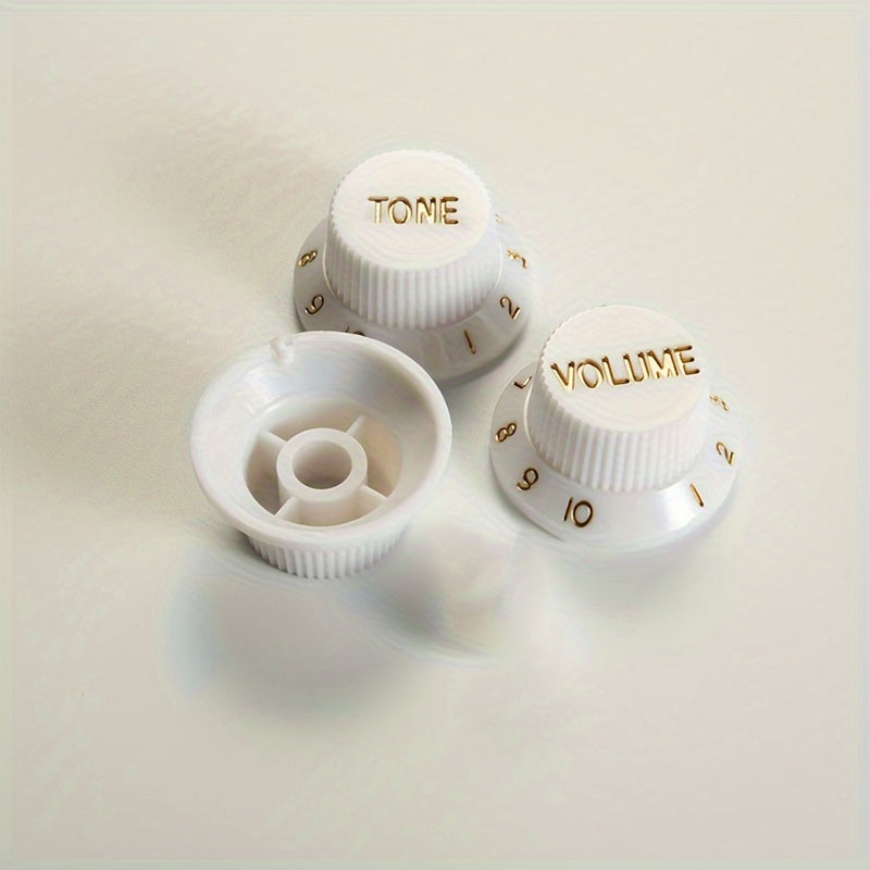 Electric guitar knob cap for volume, tone, and speed control. Available in black, white, or cream yellow.