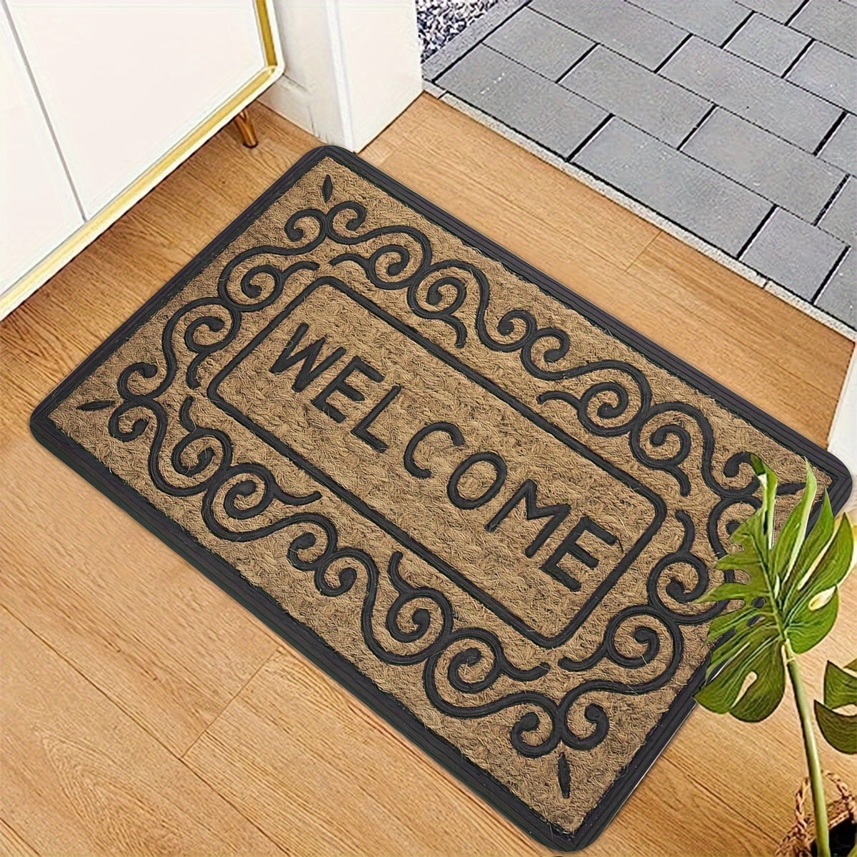 Welcome guests with the 1-piece Welcome Doormat featuring a non-slip PVC backing. This machine washable rectangle flannel textile entrance mat is perfect for both indoor and outdoor use. Use it as home décor or a washable area mat.