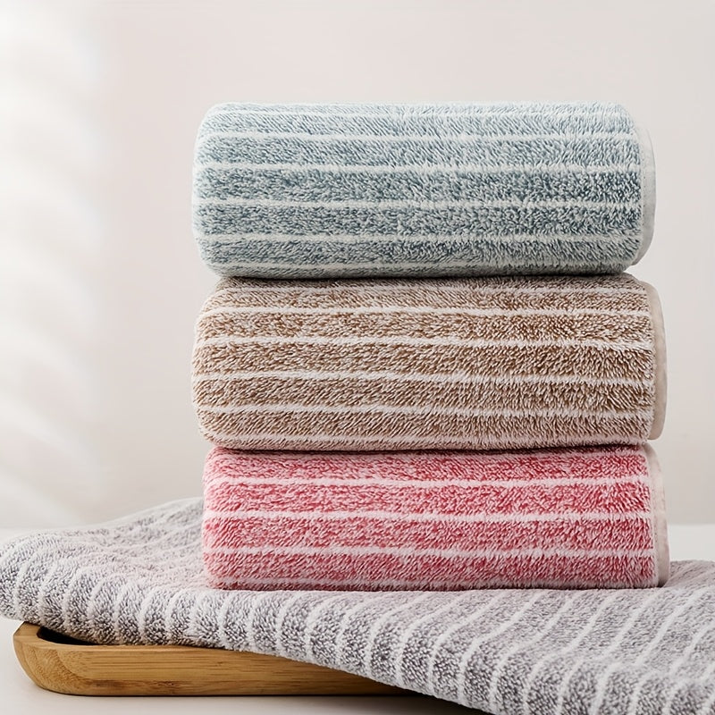 A 140cm*70cm plush bath towel perfect for home, hotel, kitchen, and more. Ultra-absorbent, soft, and gentle on skin.