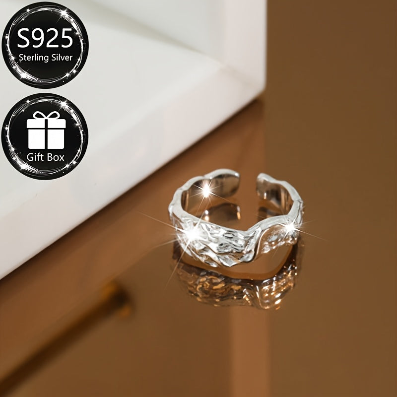 This exquisite 925 Sterling Silver Open Ring features a charming Foil Texture design that is both adjustable and elegant. With a touch of vintage luxury, it is perfect for special occasions such as banquets and makes an ideal gift. This one-of-a-kind