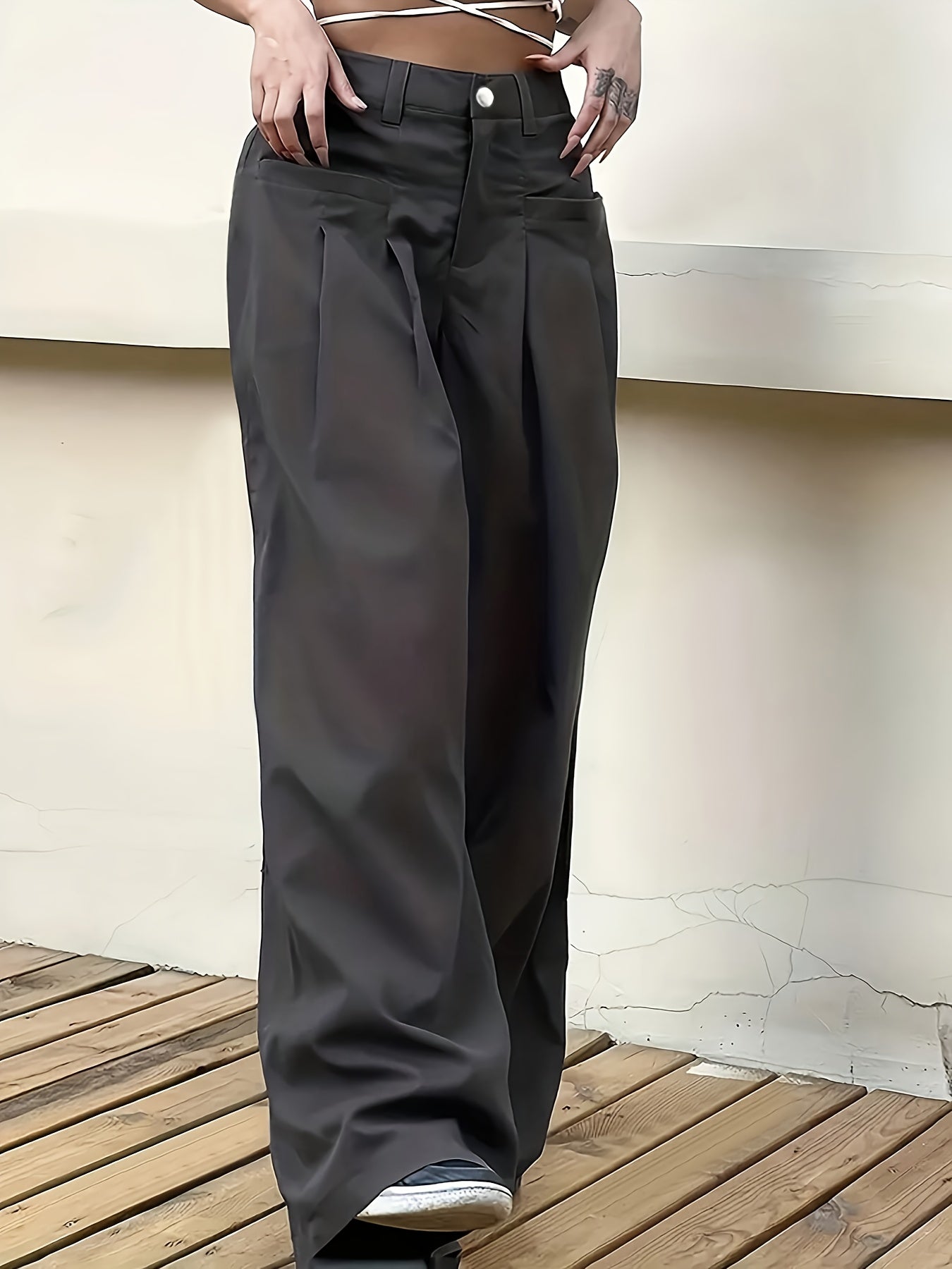 High-waisted button-front work pants in solid colors for women's office attire.