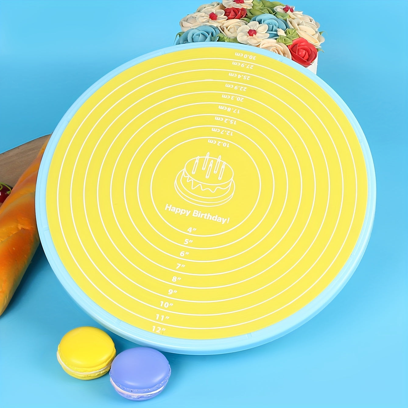 Silicone baking mat with measurements for cake turntable stand, non-stick and heat resistant. Perfect for pastry baking.