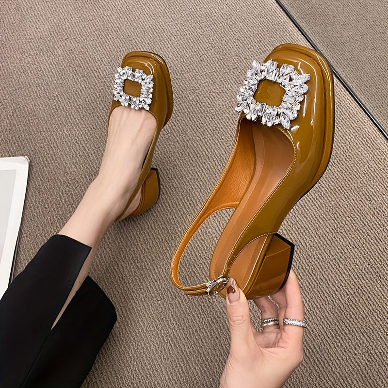 Chunky low heeled sandals with rhinestone buckle and square toe. Casual slingback strap for stylish look.