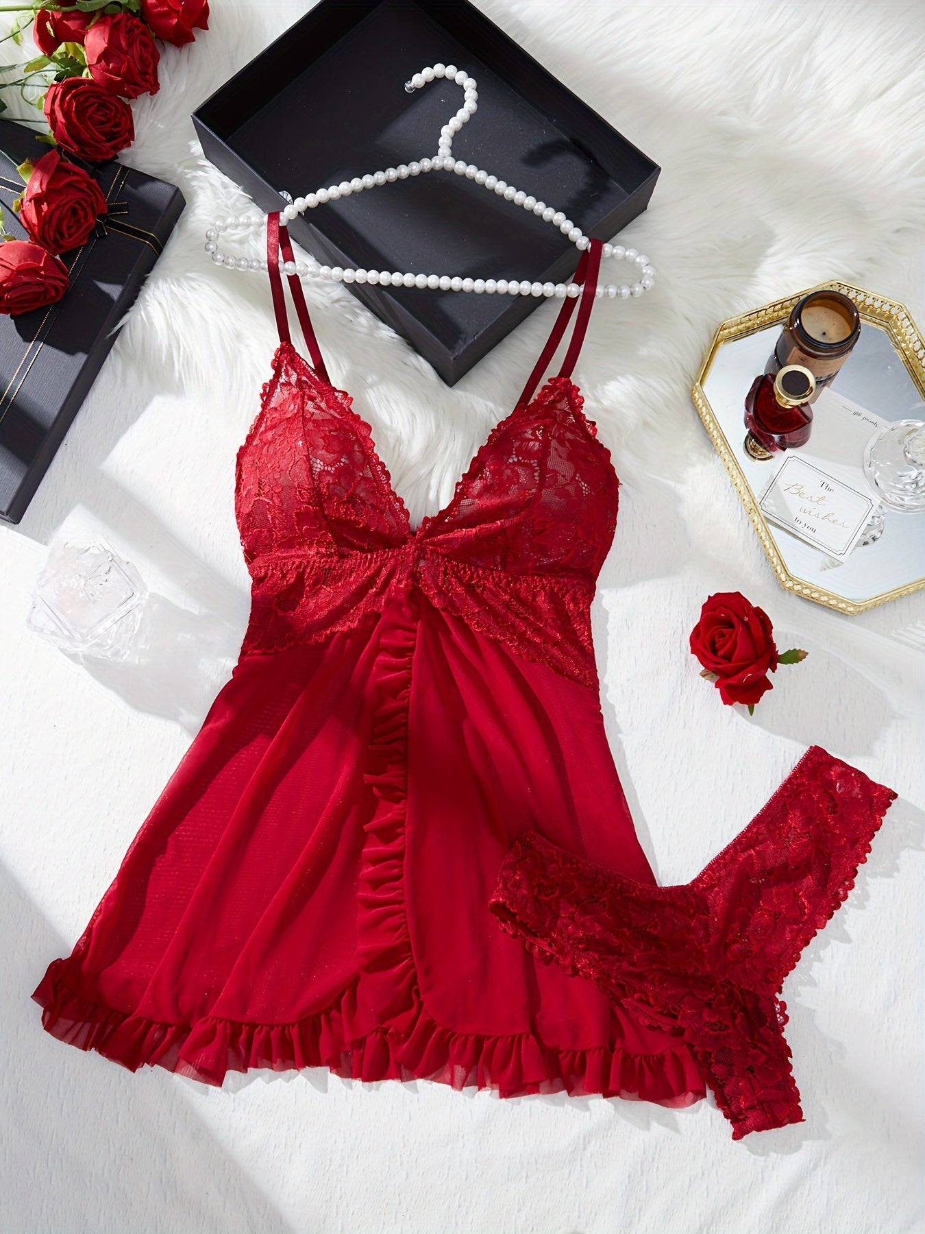 Elegant lace lingerie set with V-neck nightdress and panty, made of polyester knit fabric. Non-padded with no belt, suitable for adults.