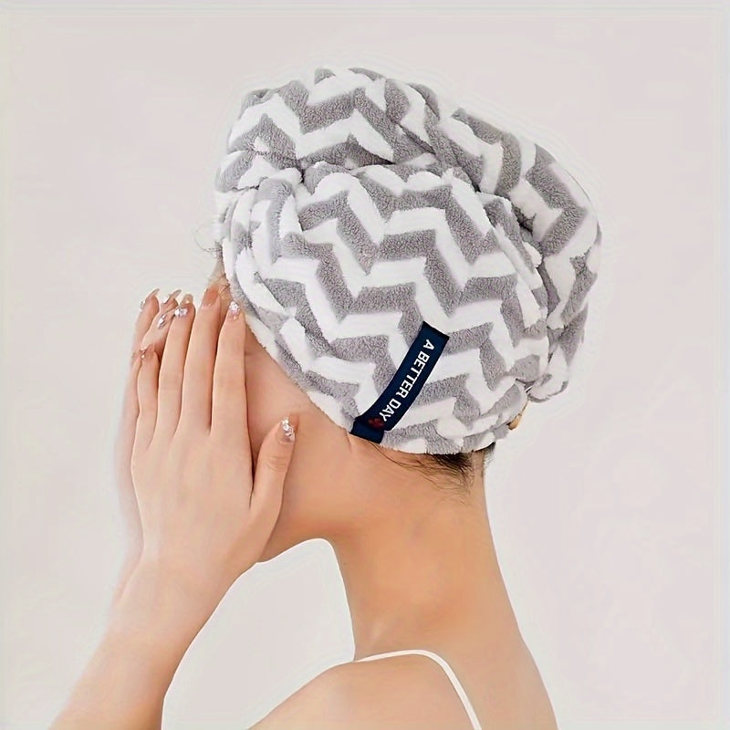 Modern blue and white striped hair towel wrap with button closure. Ultra-soft, absorbent, and low-shedding. Perfect for quick drying in a space-themed bathroom.