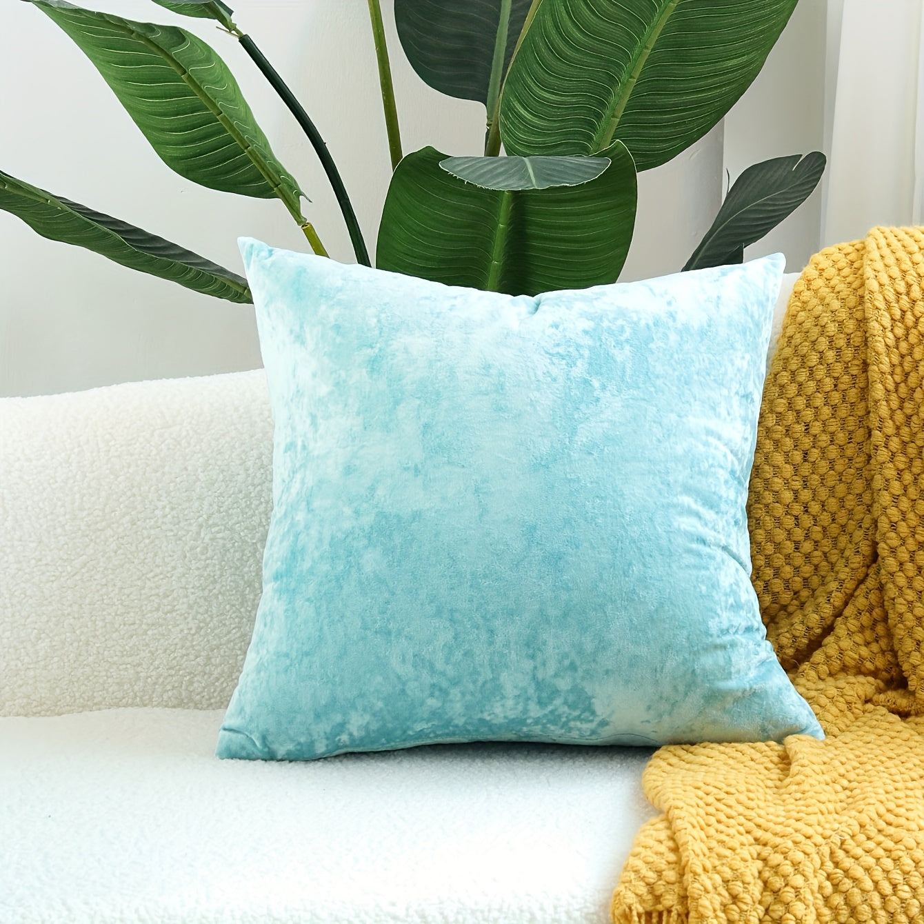 Luxurious velvet throw pillow cover with speckled texture, perfect for sofa and bed. Contemporary style with zip closure, machine washable. Made of 100% polyester.