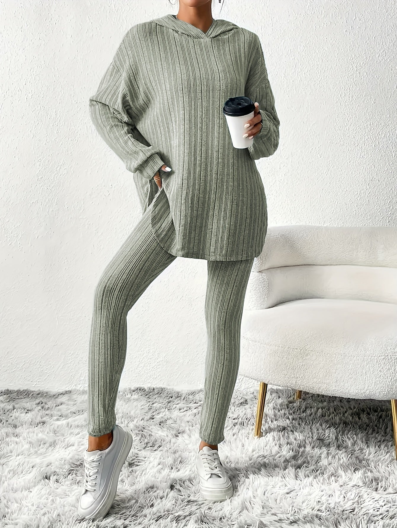 Women's cozy ribbed fleece lounge set featuring a long sleeve hoodie and stretchy leggings ideal for casual home wear in the fall/winter. Made of a comfortable polyester blend with a