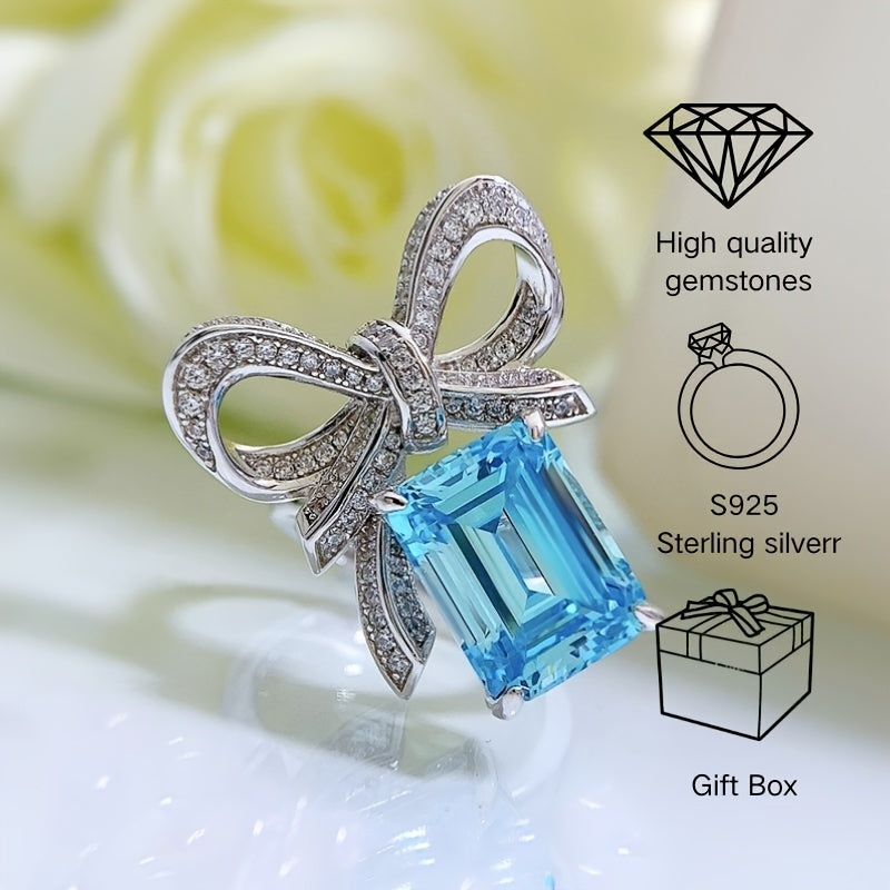 New for 2024, this stunning butterfly ring features a 9*12 aquamarine stone set in high carbon silver. Perfect for a female recipient, this ring comes in a random gift box style.