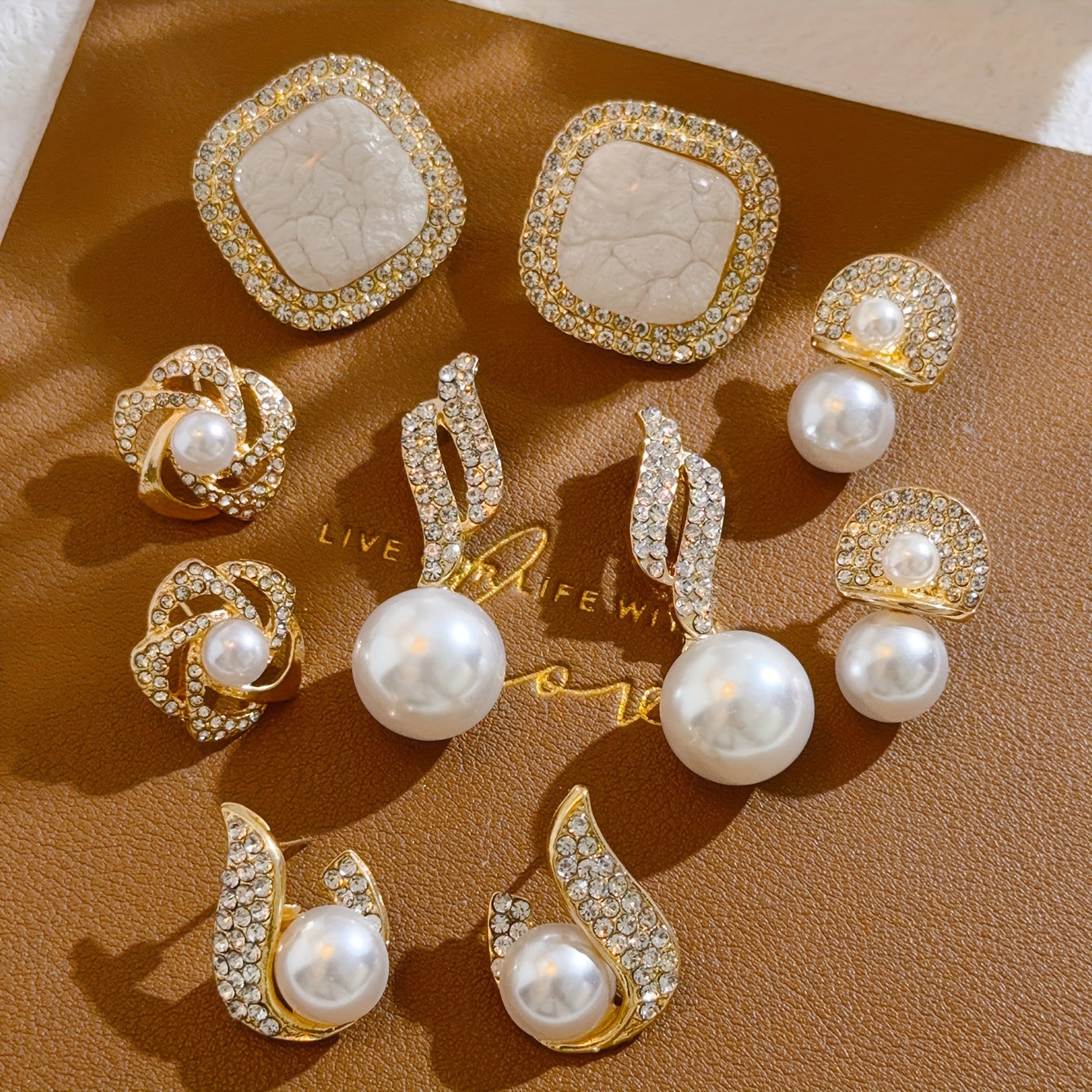 French-inspired sweet earrings set with deluxe faux-pearl, ice-crack floral, and flame design in an elegant vintage style fashion.