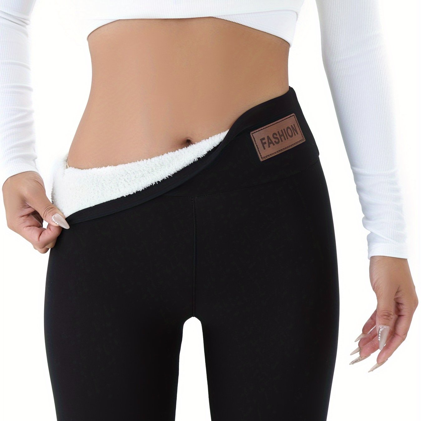 Cozy women's sportswear with tight body warmer and comfortable tights for autumn and winter.