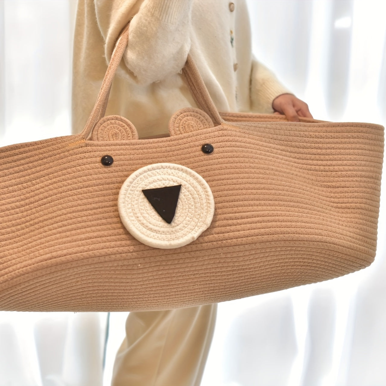 The LA DEARCHUU Portable Baby Crib features a charming Bear Design and a Foldable Fabric Cradle. It also includes a Multifunctional Weaving Storage Basket in Beige/Khaki. This product does not require batteries and is suitable for Newborns up to 3 years