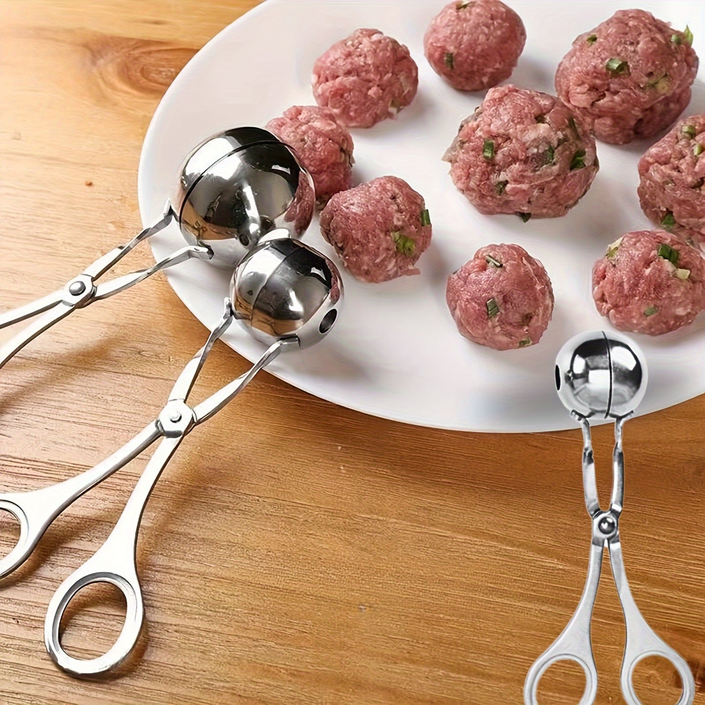 Stainless steel meat ballers with anti-slip handles for making meatballs, rice cakes, cookie dough scoops.