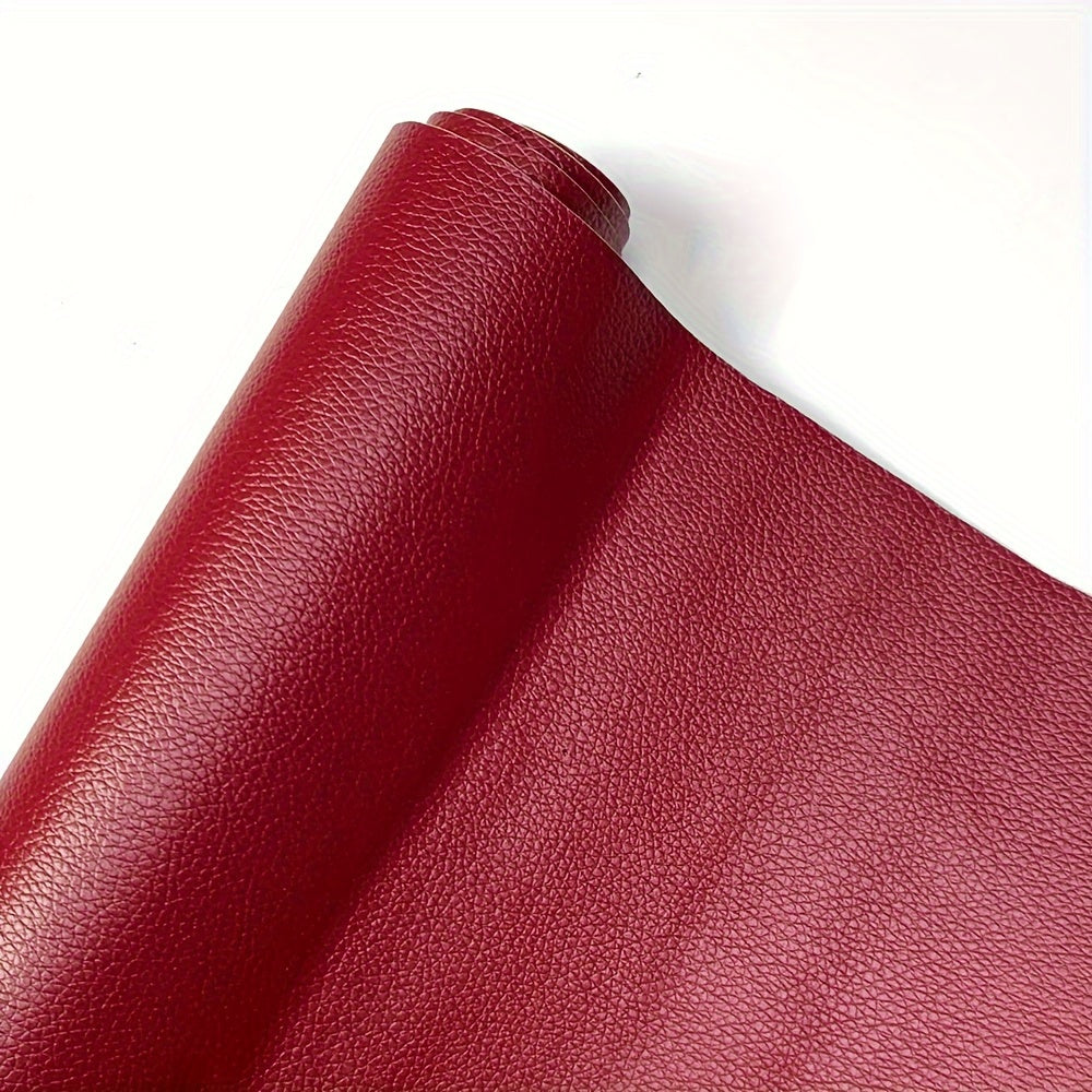 Self-adhesive leather repair film in a roll, suitable for repairing sofas, car seats, motorcycle seats, and interior door refurbishment. Waterproof litchi grain faux leather film that is fade and peeling resistant.