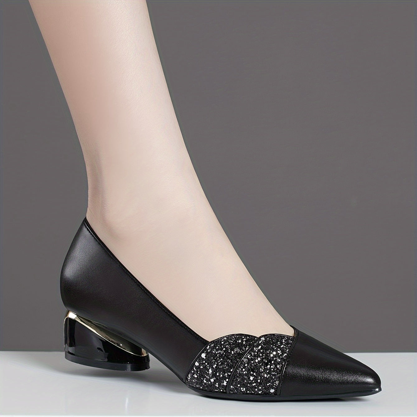 Women's chic pointed-toe pumps with rhinestone detail and comfortable chunky heel, perfect for fall.