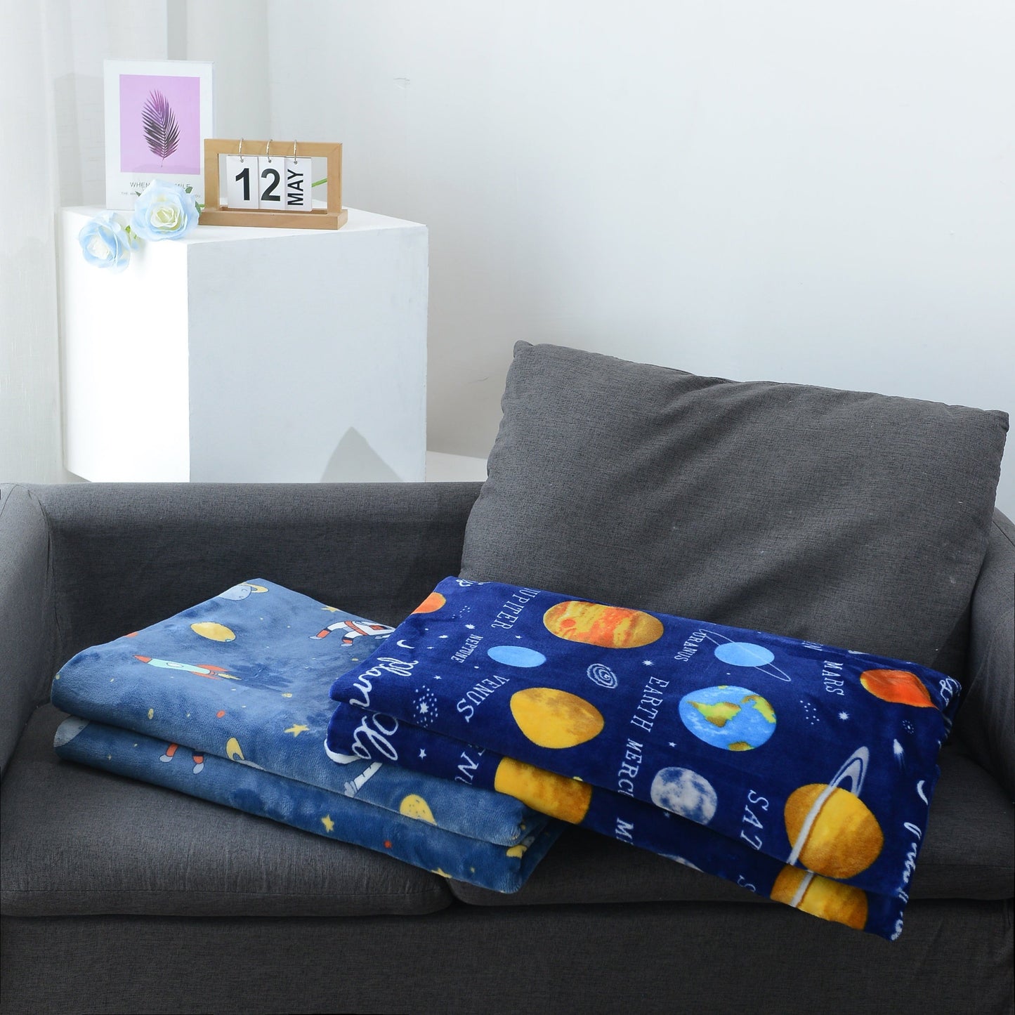 Warm and soft Cozy Astronaut Flannel Throw Blanket with Space Theme - Reversible for couch, bed, office, and travel. Perfect for galaxy lovers, nap time, and adding a touch of mission and wavering style to any space.