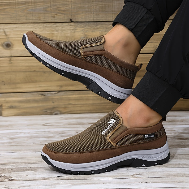 Men's slip-on sports sneakers with breathable fabric upper, round toe, and faux sole for daily wear and running.