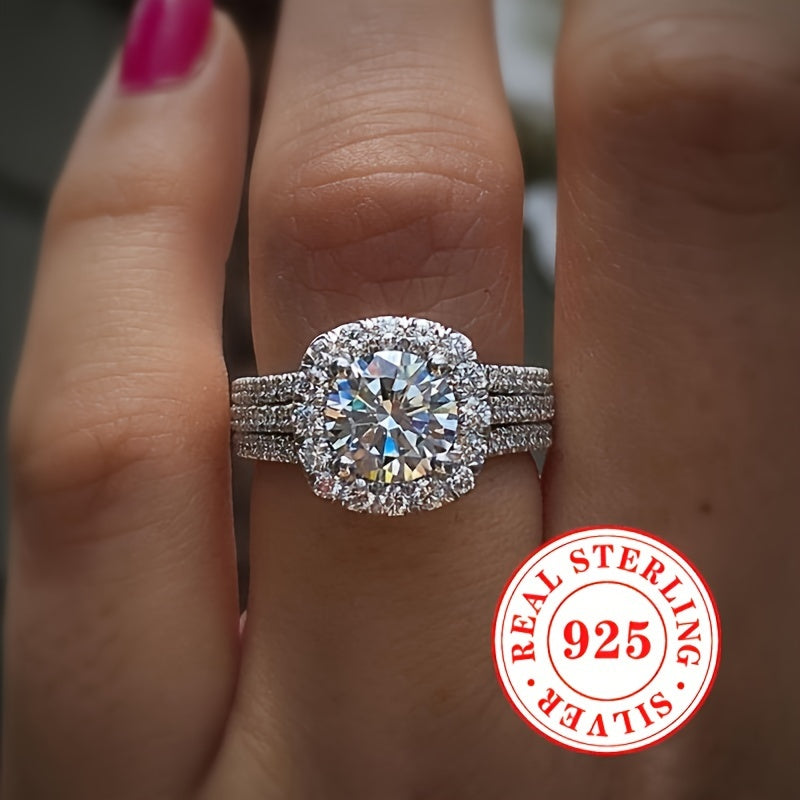 This elegant engagement ring features a timeless 4-prong setting with sparkling zirconia stones, crafted from 7.3 grams of pure S925 silver. Ideal for a romantic wedding banquet, this high-end ring is a stunning piece of jewelry for any lady.