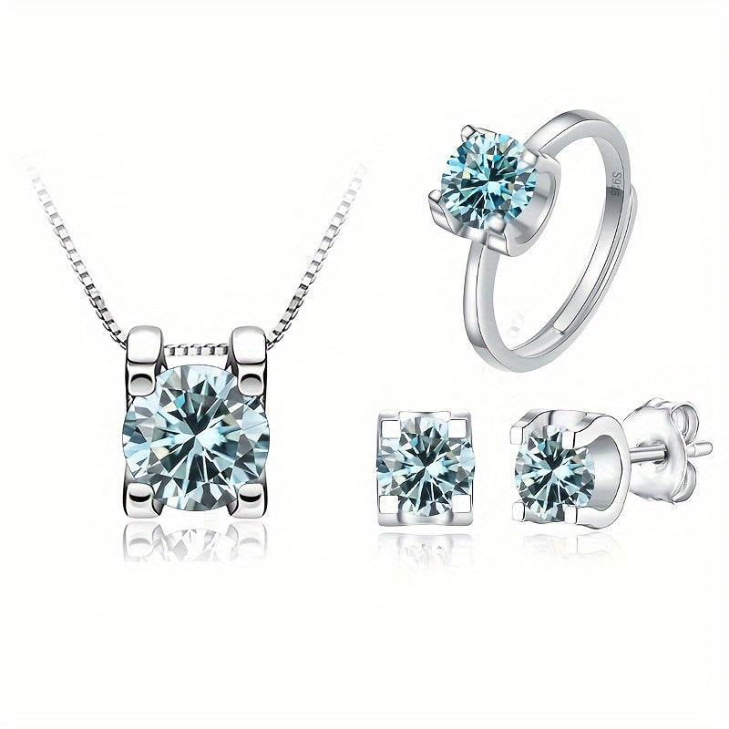 Complete 925 Sterling Silver Moissanite Jewelry Set featuring 1 pair of Earrings, 1 Necklace, and 1 Ring adorned with a 1ct Moissanite stone. High quality pieces ideal for Engagement or Wedding, a perfect Christmas gift complete with Certificate and Box.