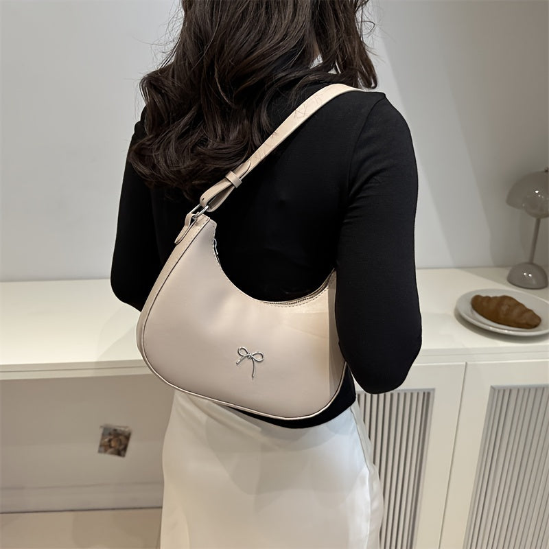 New Korean style shoulder bag with unique design, beautiful and fashionable crescent shape.