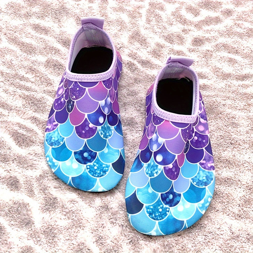 Colorful fish scale print slip-on water shoes for toddler girls, perfect for summer fun at the beach.