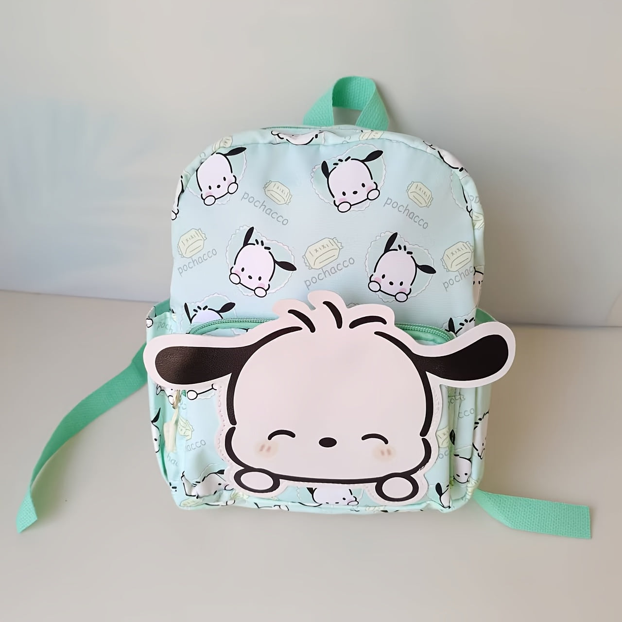 Sanrio backpacks for kids featuring cute cartoon designs, lightweight & durable canvas material, available in multiple colors & patterns, with large capacity and zippered closure.