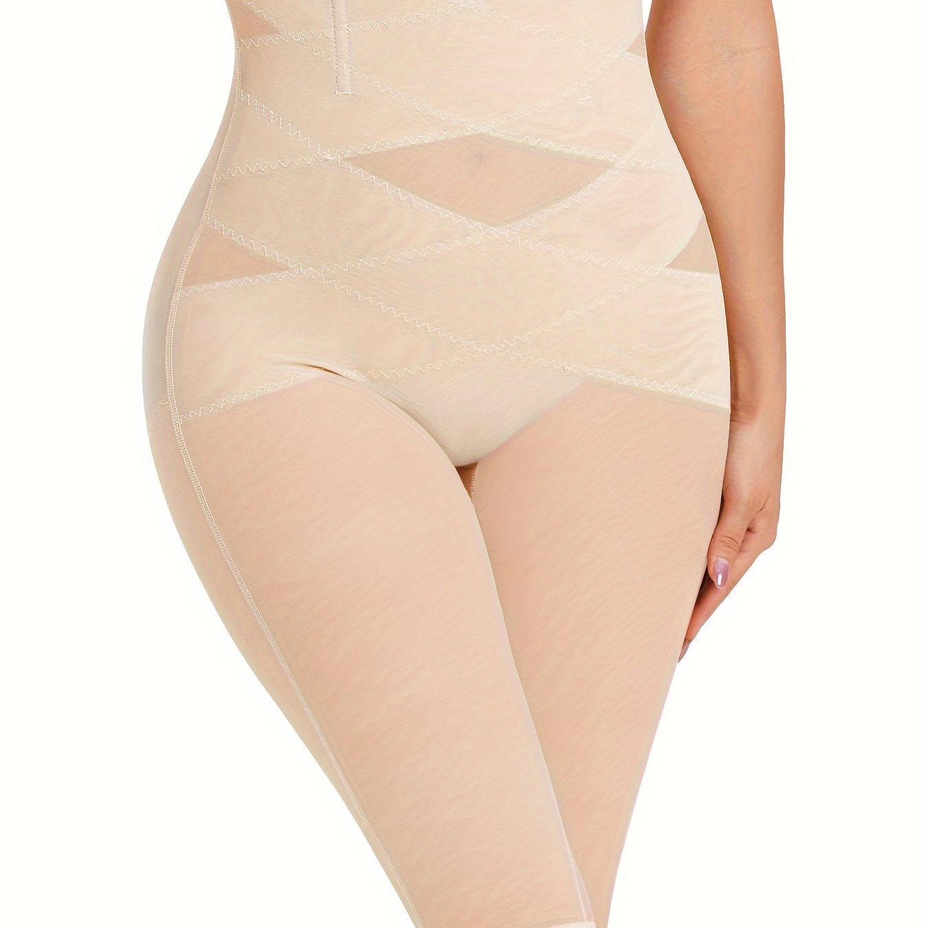 Women's lace trim shaping shorts with tummy control compression for slimming and shaping.