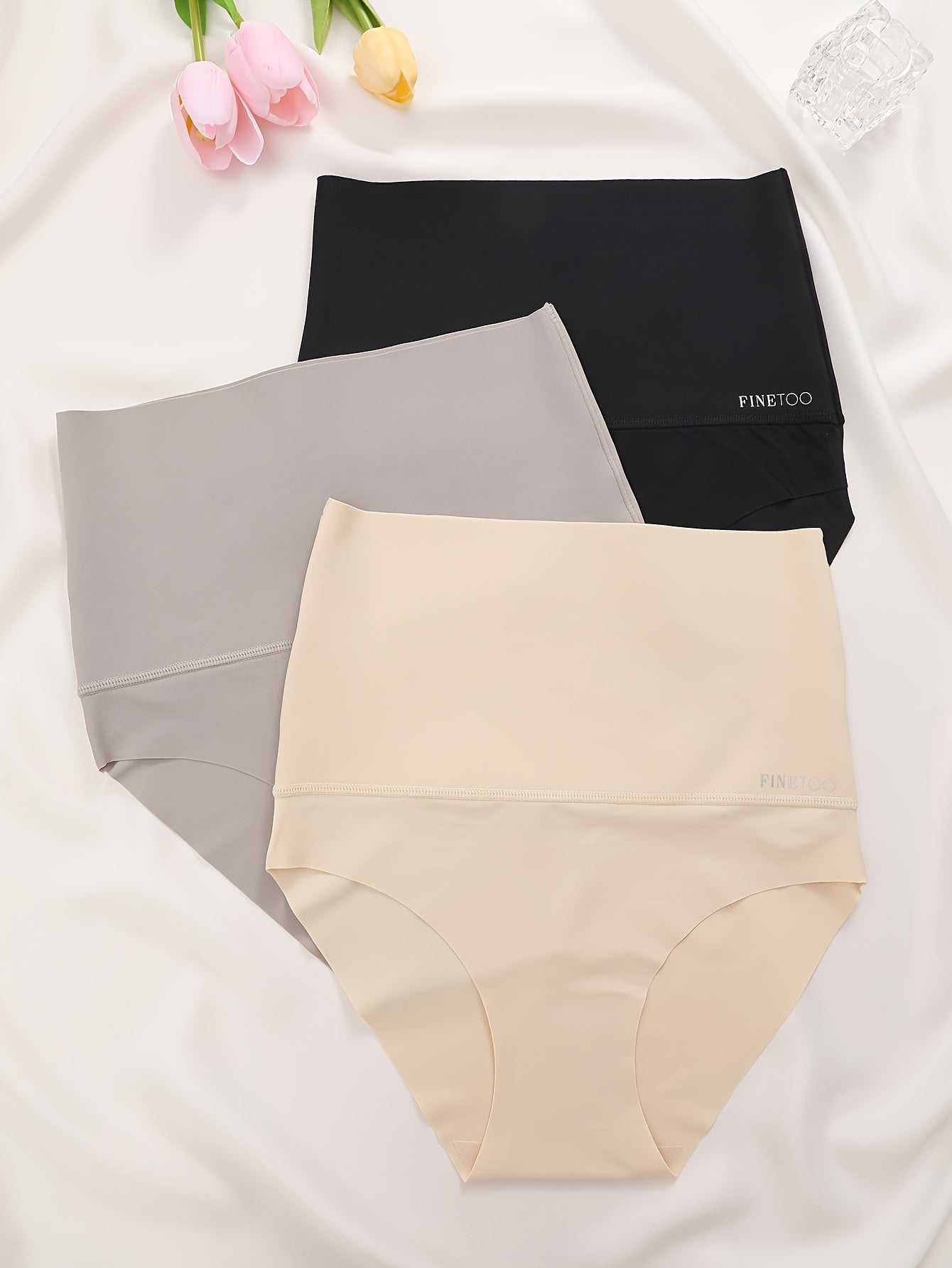 3 high-waisted solid briefs for women, offering seamless slimming comfort.