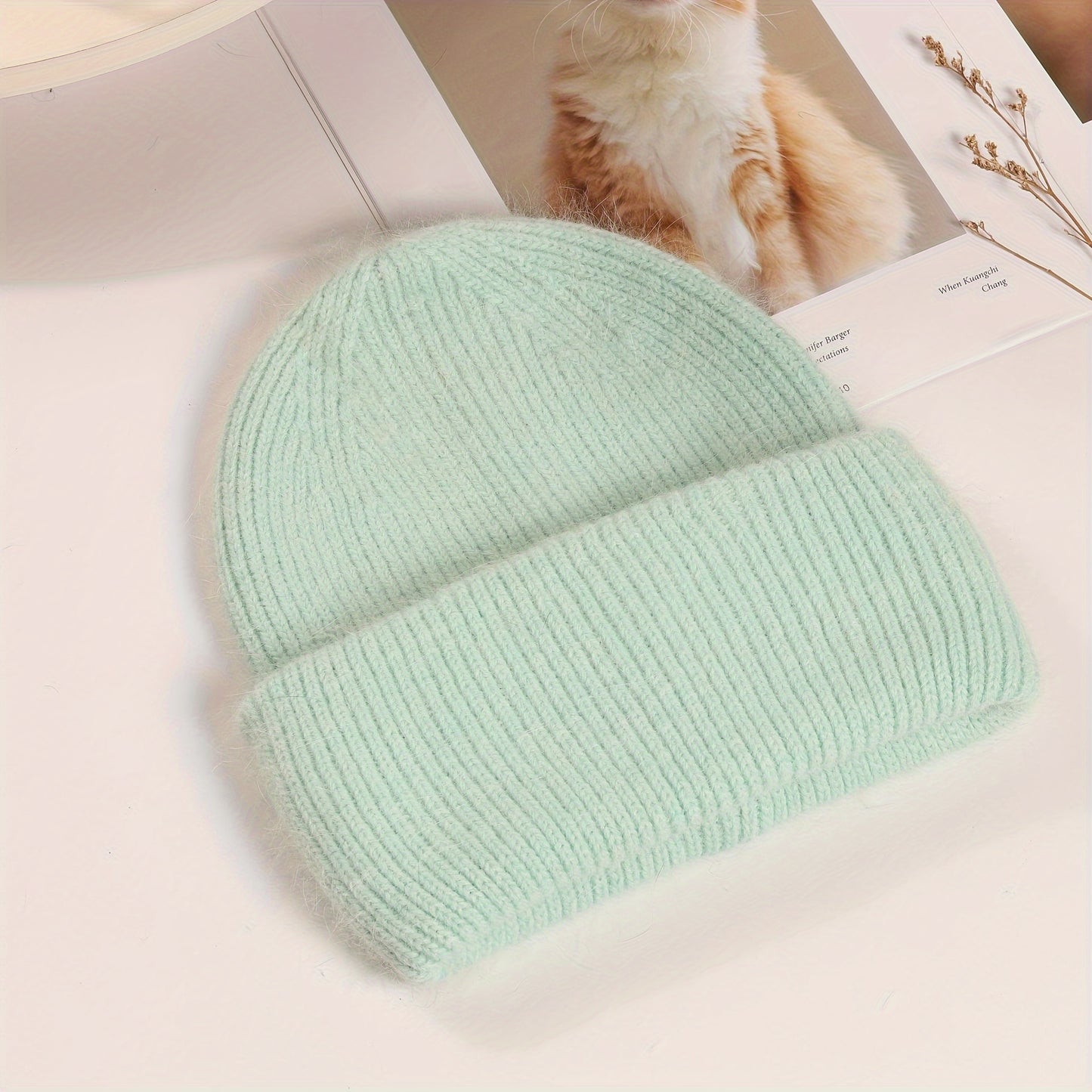 Soft knit beanie in candy colors for women, perfect for casual wear in autumn and winter.