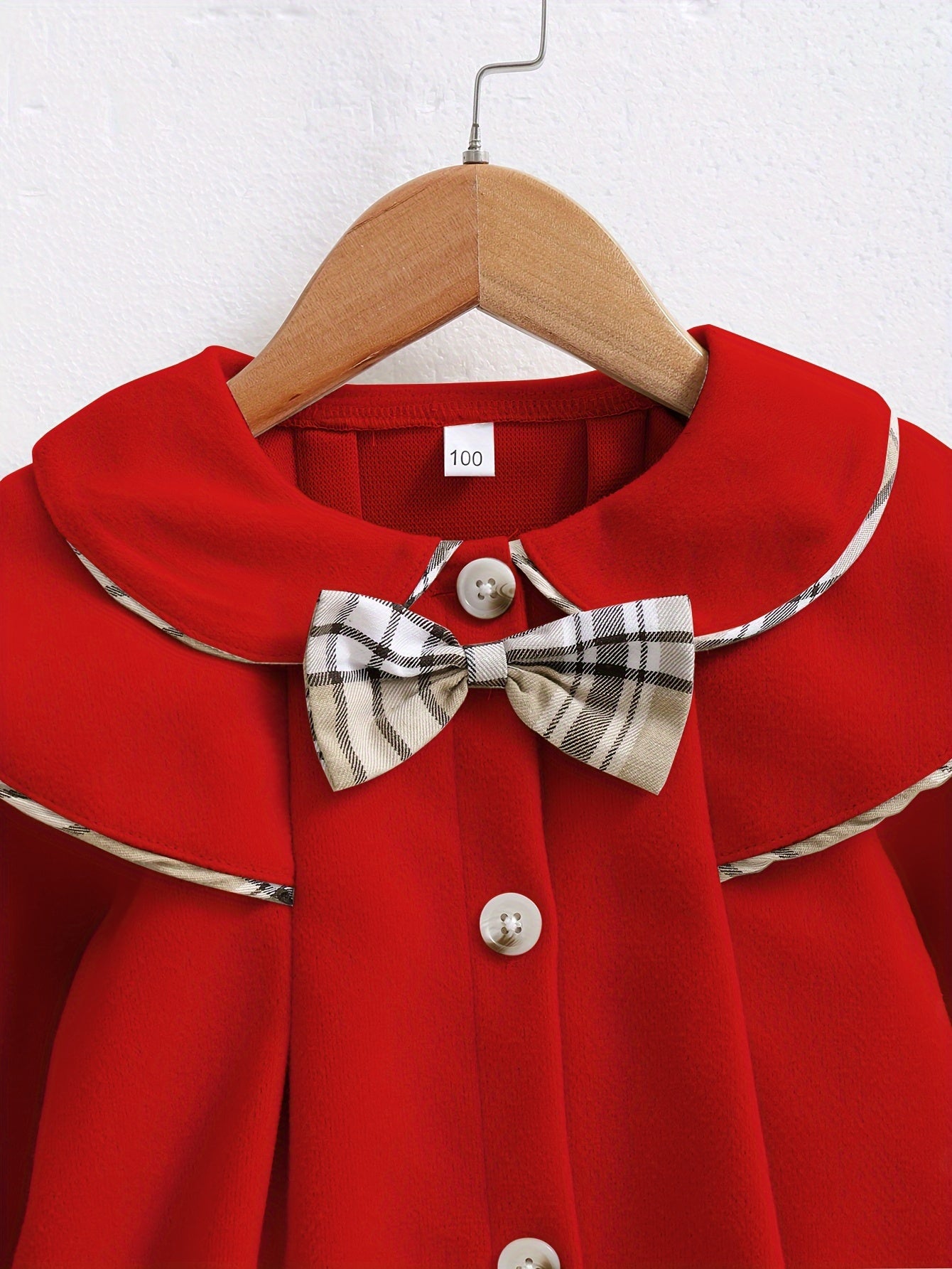 Chic Girls' Red Long-Sleeve Fleece Coat with Bow Detail has a casual round neck, button front, and is machine washable. Perfect for autumn/winter outerwear.