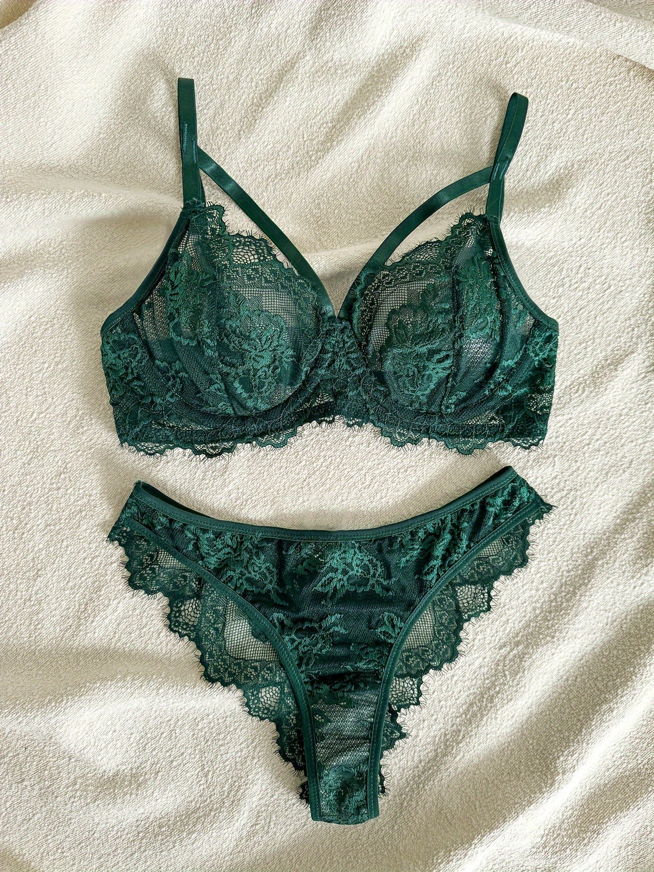 Floral lace lingerie set with underwire bra and briefs for women.