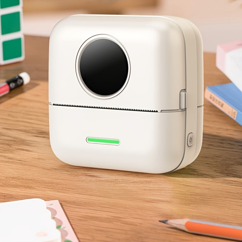 Portable mini thermal printer with monochrome label and photo printing, USB charging, wireless capability, and energy-efficient thermal technology powered by an 800mAh lithium battery ≤36V.