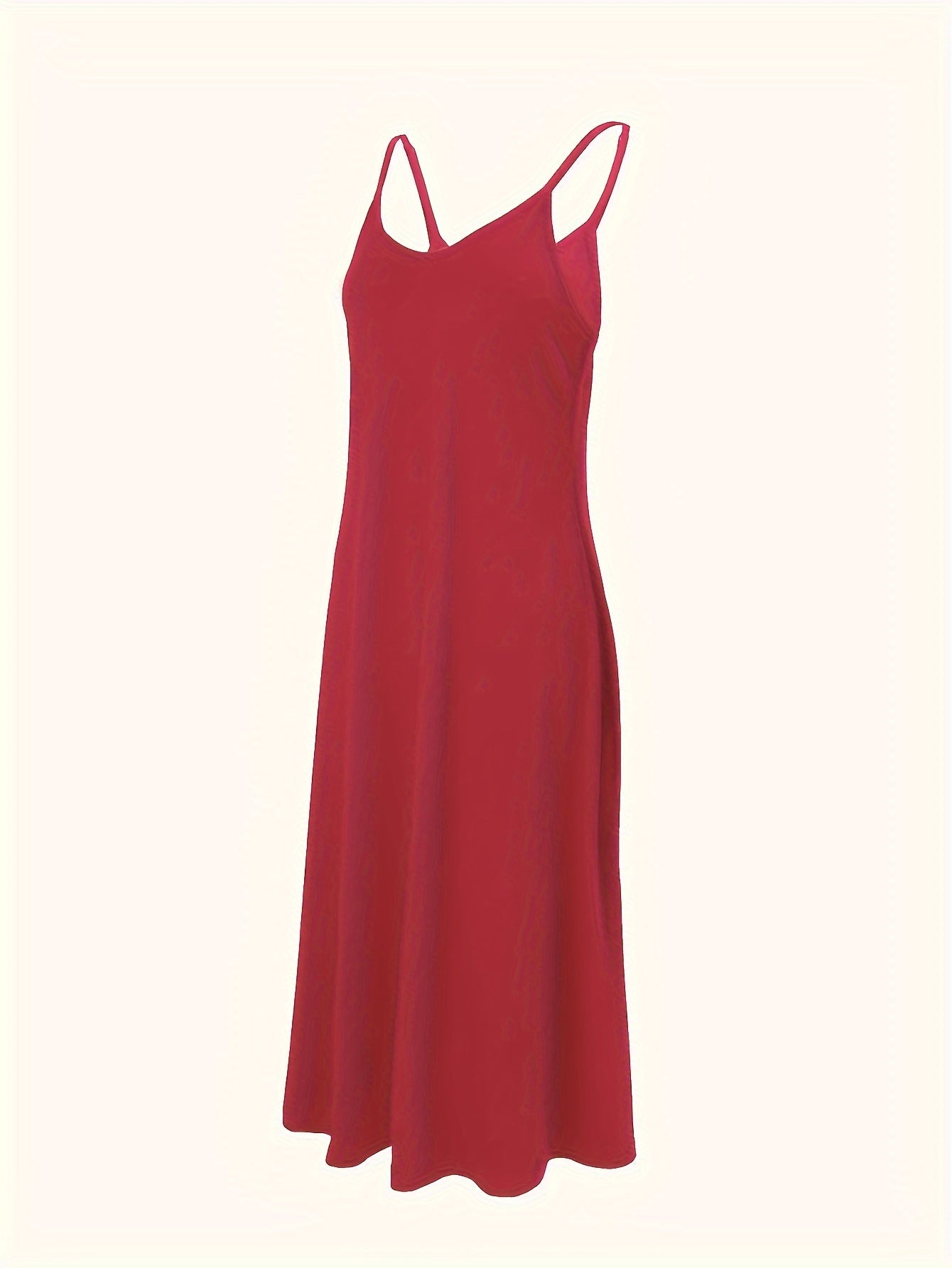 Sleeveless shoulder-baring lounge dress for women, with adjustable straps and flowing skirt. Made of comfortable knit polyester fabric, machine washable.