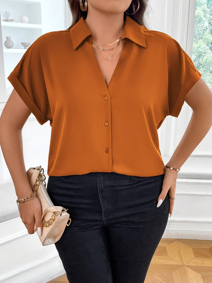 Plus size solid collared blouse with short sleeves and button details, perfect for spring.