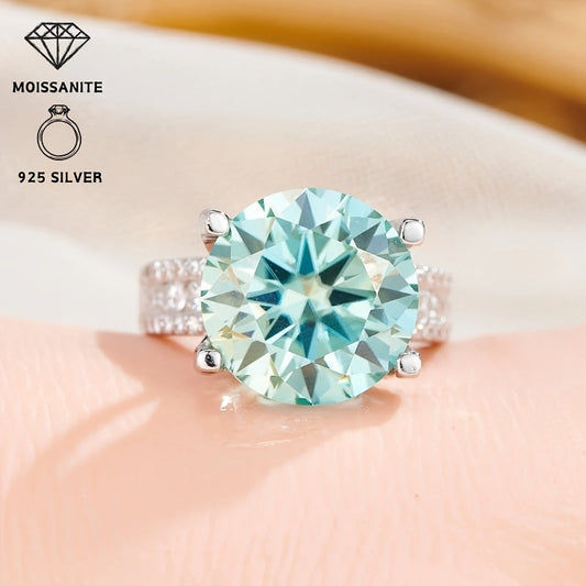 This stunning 10CT Teal Moissanite Engagement Ring features a sparkling 925 silver band, making it the ideal choice for weddings, parties, and as a December birthstone gift.