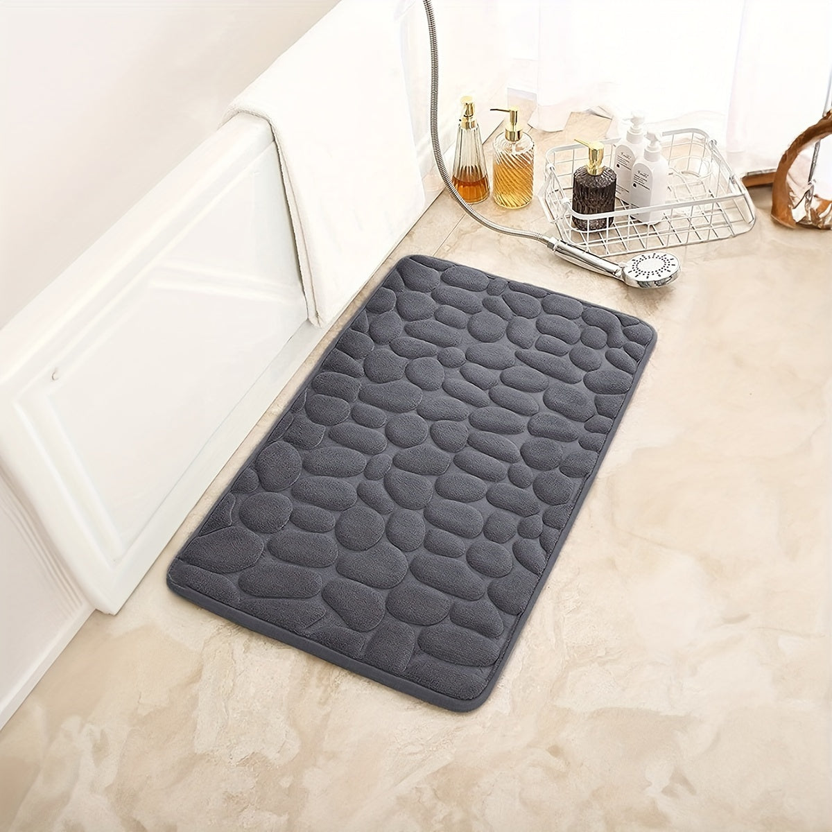 1 piece of Pebble Pattern Floor Mat made with memory cotton for the bathroom, designed to absorb water at the doorstep, featuring a non-slip backing for added safety. Can also be used as a carpet.