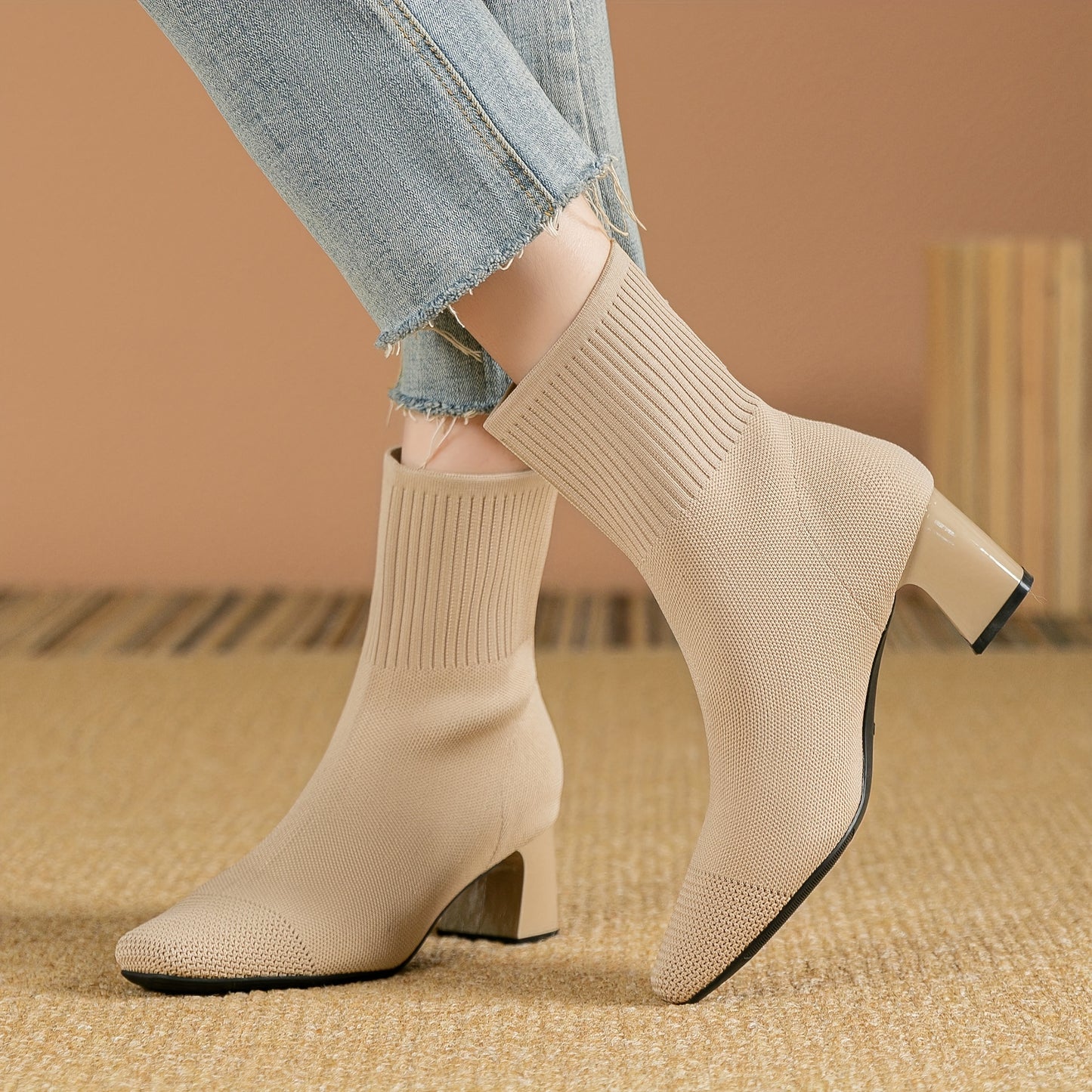 Women's square toe sock boots with high heel, solid color knit design, stretchy slip on style.