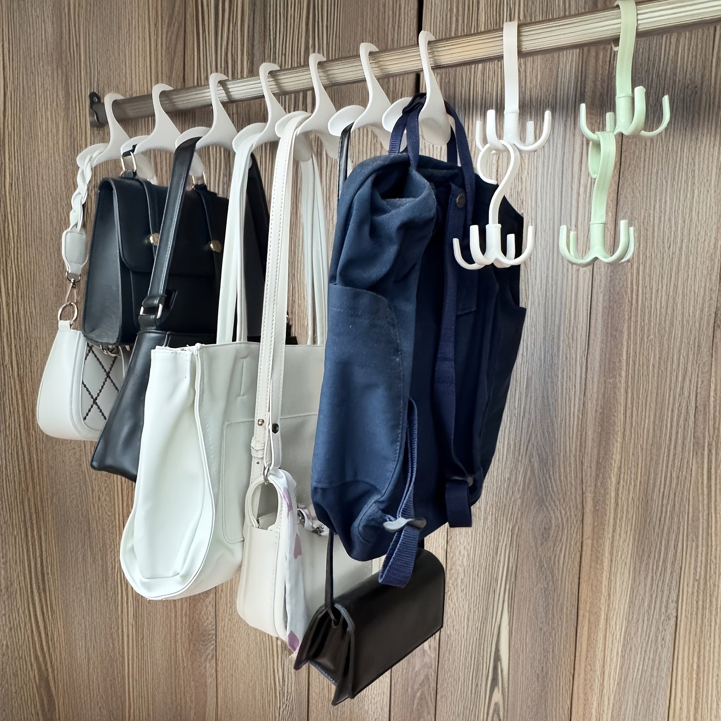 This multifunctional wardrobe set includes 14 pieces of widened design hooks, perfect for storing bags and clothes. The rotating hooks can be used for various purposes, making it a versatile addition to your storage solutions.