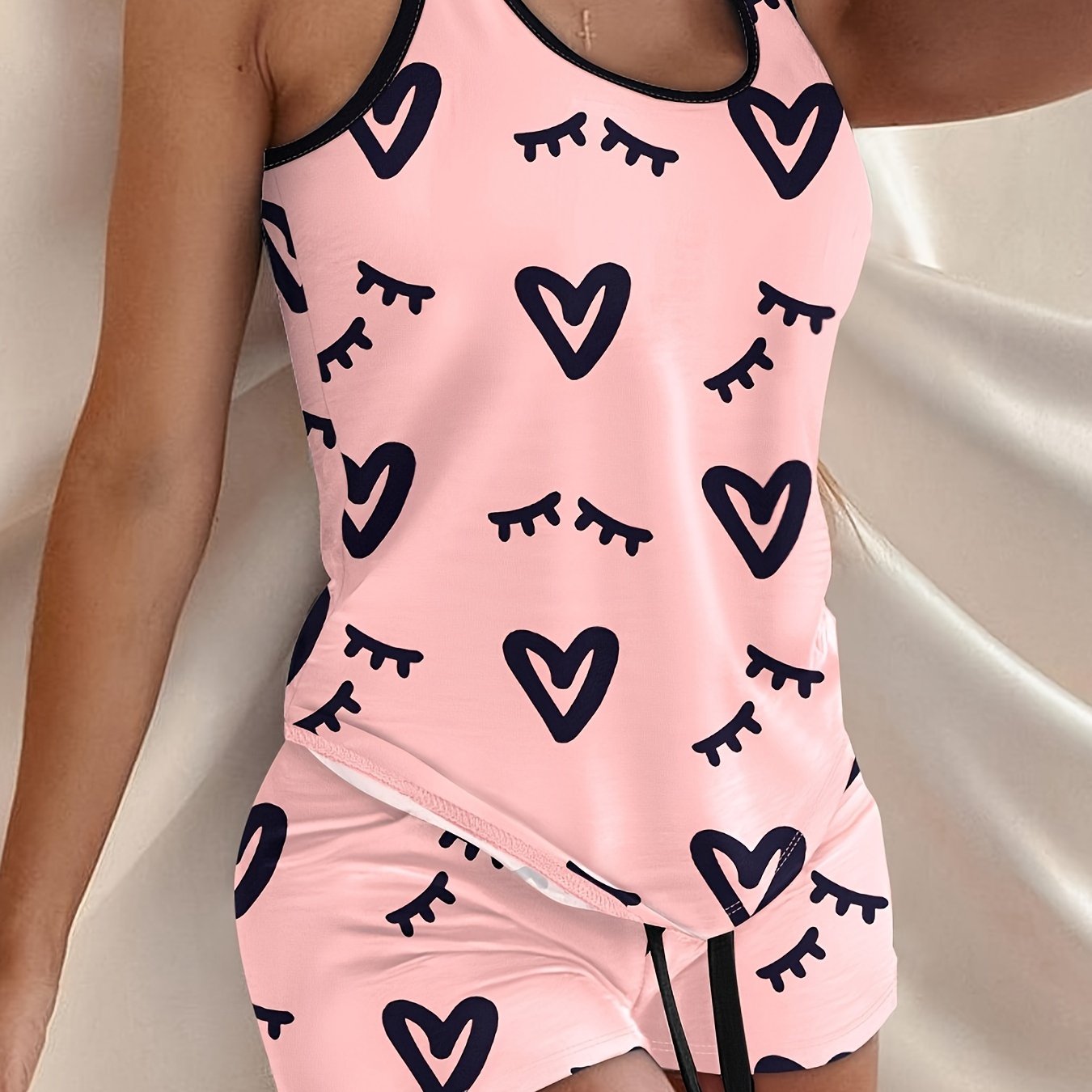 Heart and letter print pajama set including crew neck tank top and drawstring shorts for women's loungewear.