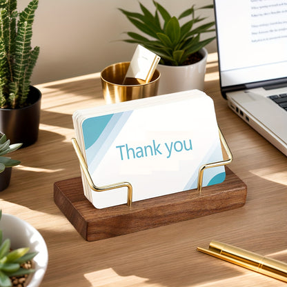 Walnut wood business card holder for desk display and organization.